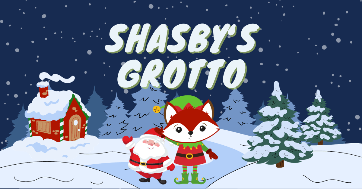 White bubble writing says 'Shasby's Grotto'. The background is dark blue with a faint snow effect. Illustrations show snowy hills, a festive house, a fox dressed as an elf standing slightly in front of Santa.